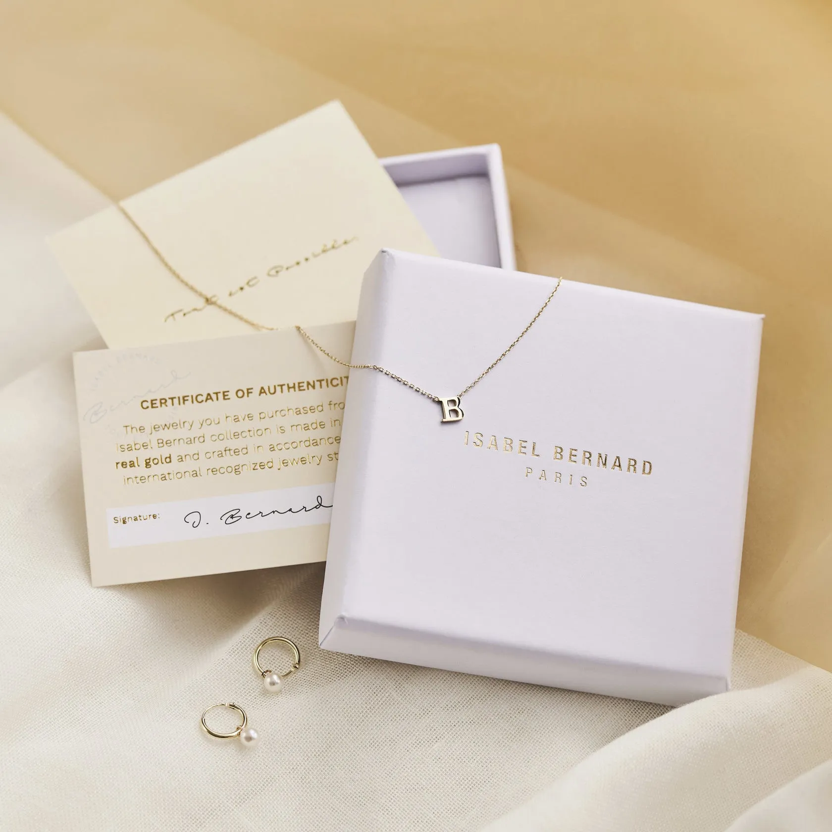 Cadeau d'Isabel 14 karat rose gold necklace & bracelet set with heart