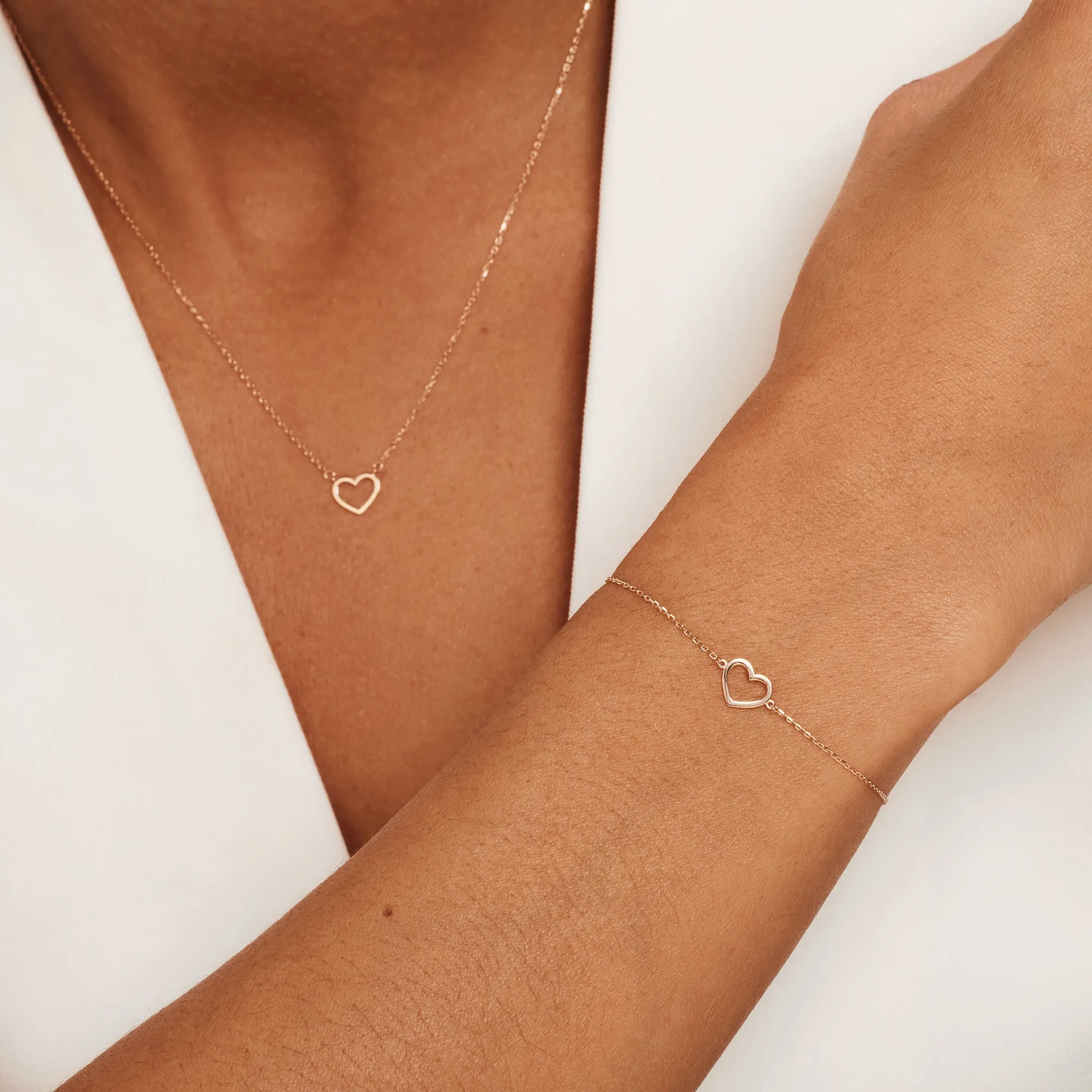 Cadeau d'Isabel 14 karat rose gold necklace & bracelet set with heart