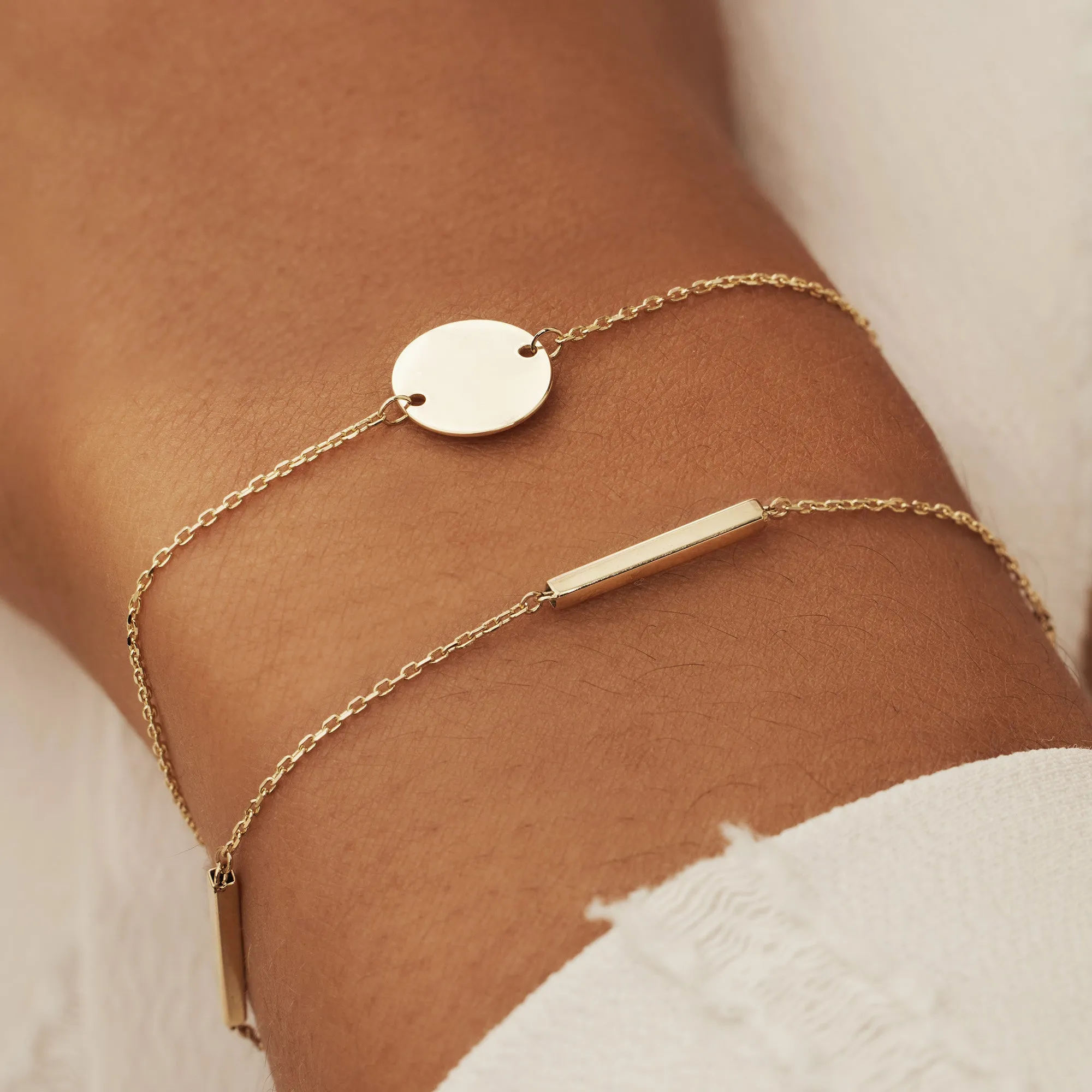 Le Marais Jeanne 14 karat gold bracelet with coin