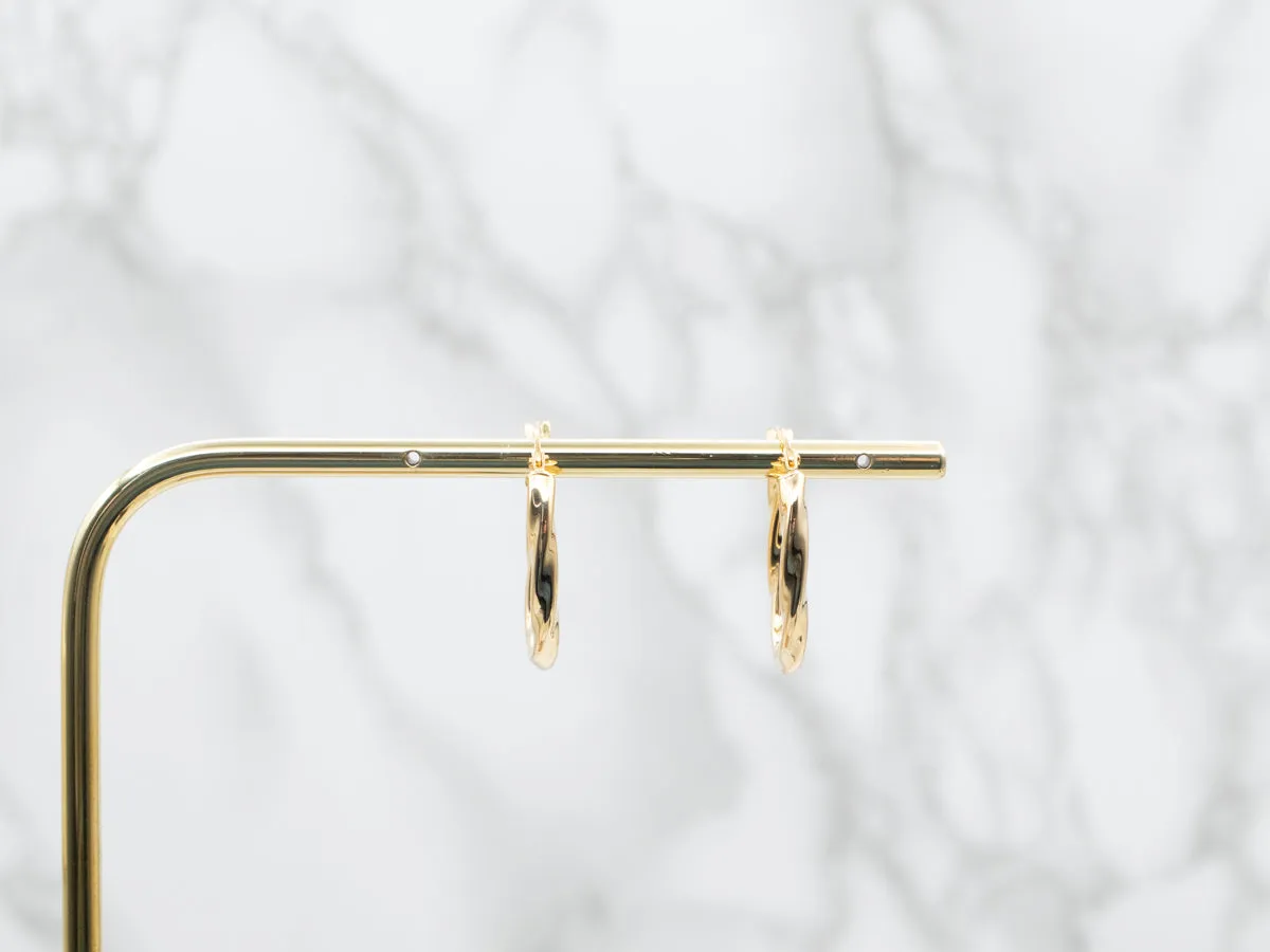 Oval Gold Twist Hoop Earrings
