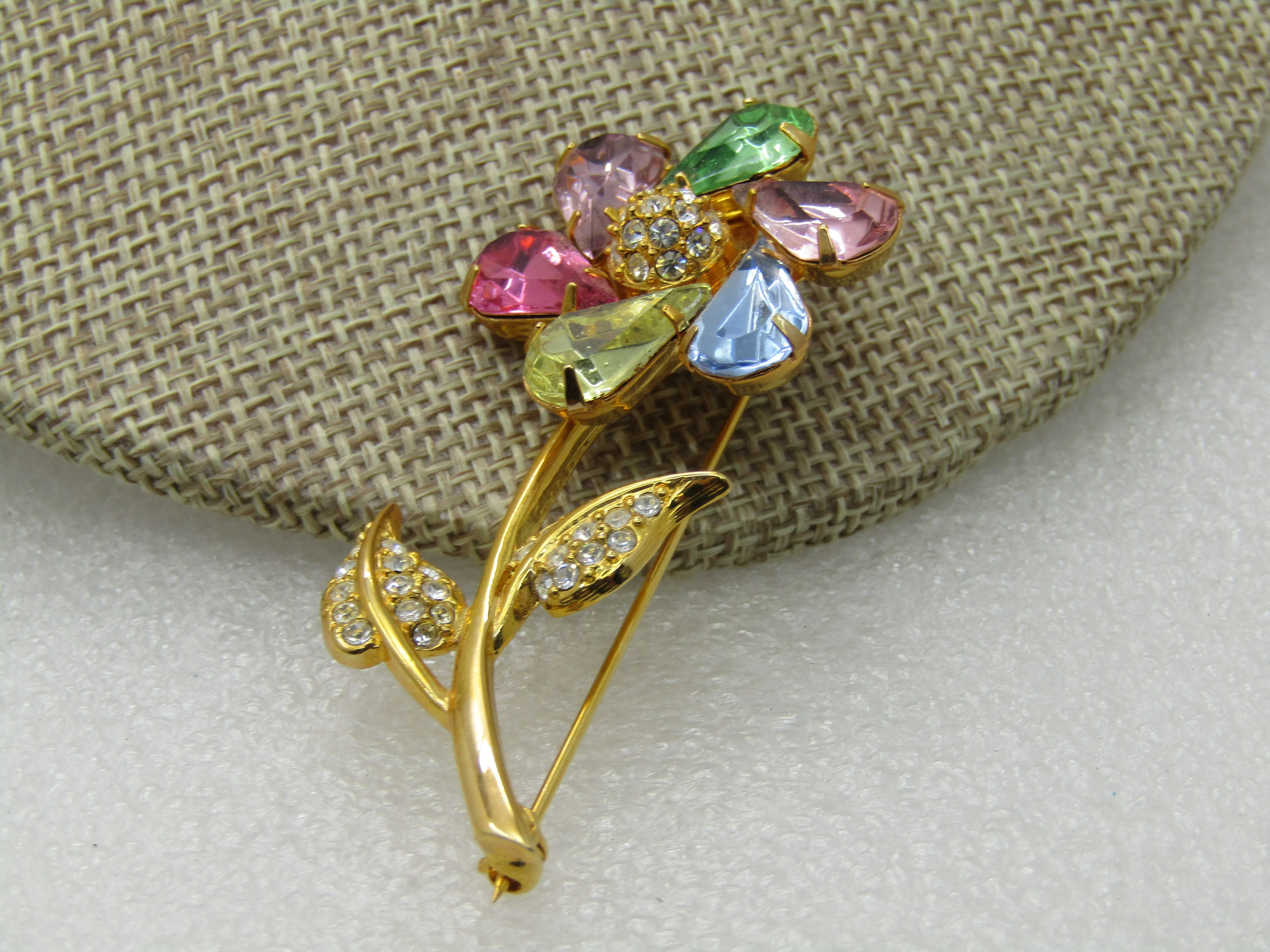 Vintage Joan Rivers Rhinestone Spinning Floral Brooch, Pinwheel, Pastels, gold tone. 2.5"